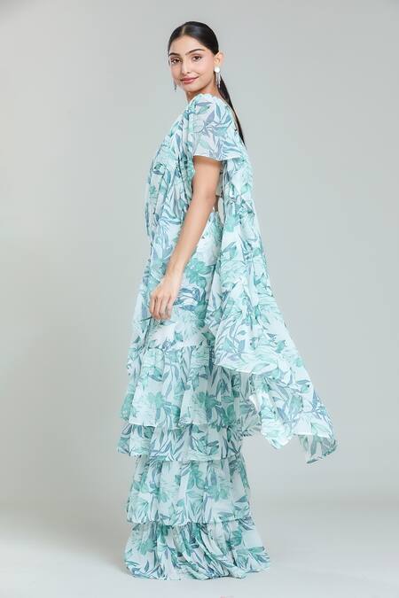 Buy Naintara Bajaj White Georgette V-neck Cloudburst Woods Print Tiered Pre-draped Ruffle Saree Set Buy_Naintara Bajaj_White Georgette V-neck Cloudburst Woods Print Tiered Pre-draped Ruffle Saree Set