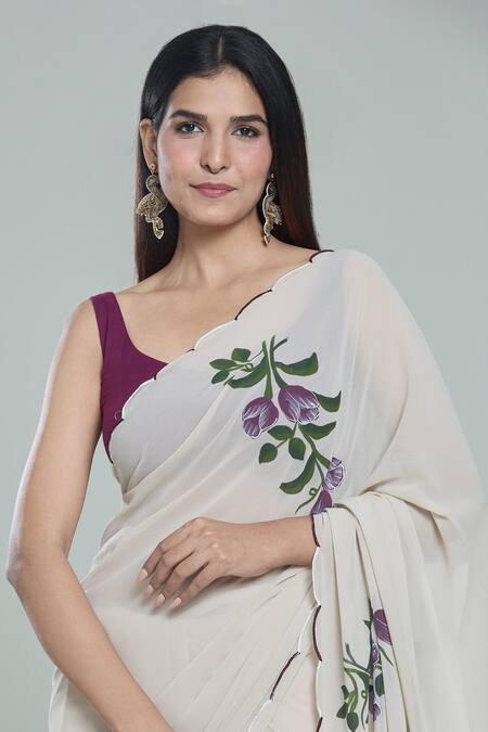 Naintara Bajaj_Beige Georgette Tulip Handpainted Scallop Border Saree With Blouse_Online_at_Aza_Fashions