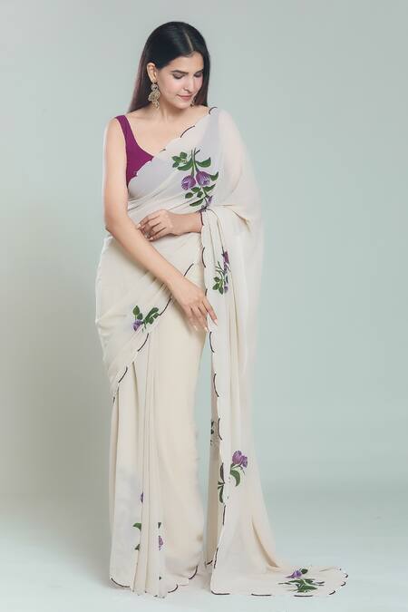 Naintara Bajaj_Beige Georgette Tulip Handpainted Scallop Border Saree With Blouse_at_Aza_Fashions