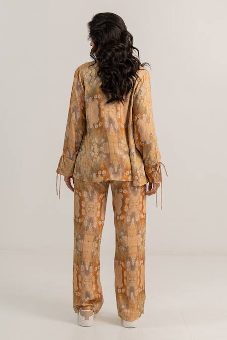 Shop Kritika Madan Label Beige Modal Satin Printed Abstract Collared Shirt Pant Set at Aza Fashions Shop_Kritika Madan Label_Beige Modal Satin Printed Abstract Collared Shirt Pant Set_at_Aza_Fashions