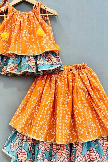 Label Neeti_Orange Cotton Tassels, Bows Double Layered Printed Lehenga And Top Set _Online_at_Aza_Fashions