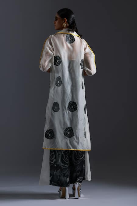 Shop Devina Juneja Black Thick Organza Fabric Applique Rosa Spread Lapel Leather Trench Coat at Aza Fashions Shop_Devina Juneja_Black Thick Organza Fabric Applique Rosa Spread Lapel Leather Trench Coat _at_Aza_Fashions