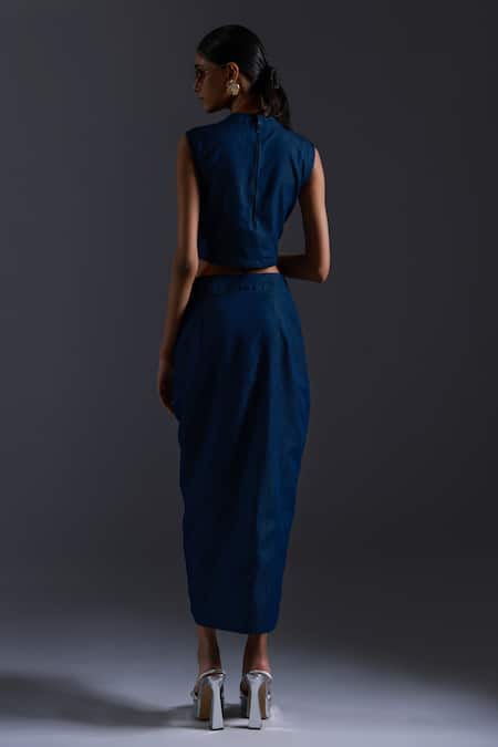 Shop Devina Juneja Blue Thin Denim Scrap Leather Boat Neck And Dori Sphere Tassel Embellished Top at Aza Fashions Shop_Devina Juneja_Blue Thin Denim Scrap Leather Boat Neck And Dori Sphere Tassel Embellished Top _at_Aza_Fashions