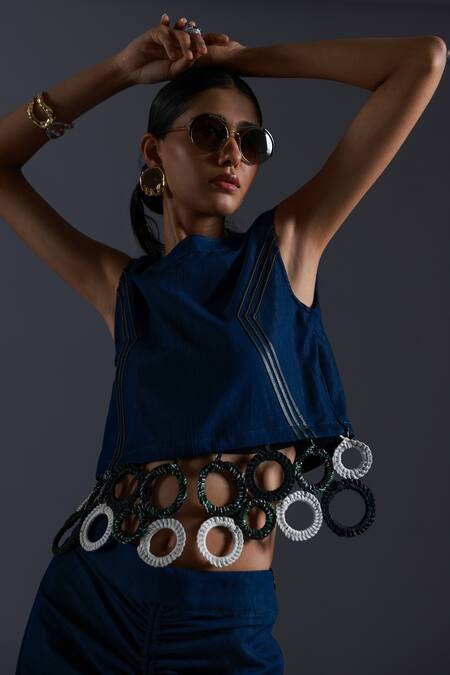 Devina Juneja Blue Thin Denim Scrap Leather Boat Neck And Dori Sphere Tassel Embellished Top Online at Aza Fashions Devina Juneja_Blue Thin Denim Scrap Leather Boat Neck And Dori Sphere Tassel Embellished Top _Online_at_Aza_Fashions