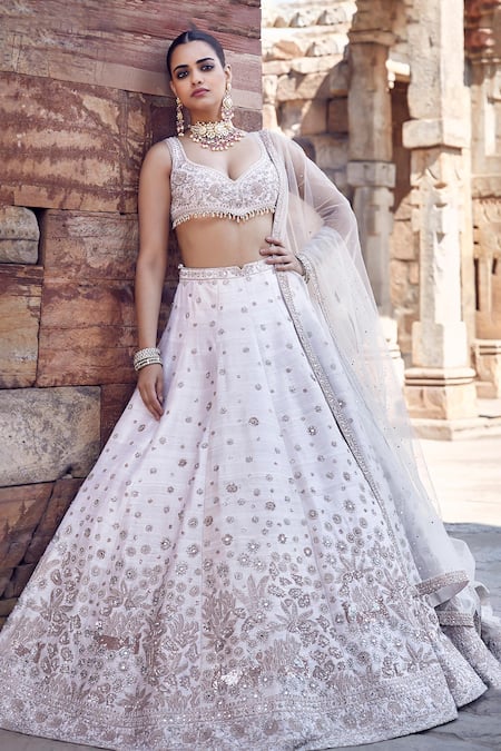 Buy_Matsya_Ivory Silk, Net Pearls, Sequins, Royal Nandi Raw Embroidered Bridal Lehenga Set 