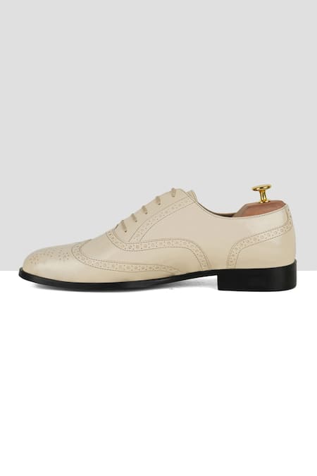 Ankit V Kapoor_Off White Solid Brogue Shoes _Online_at_Aza_Fashions