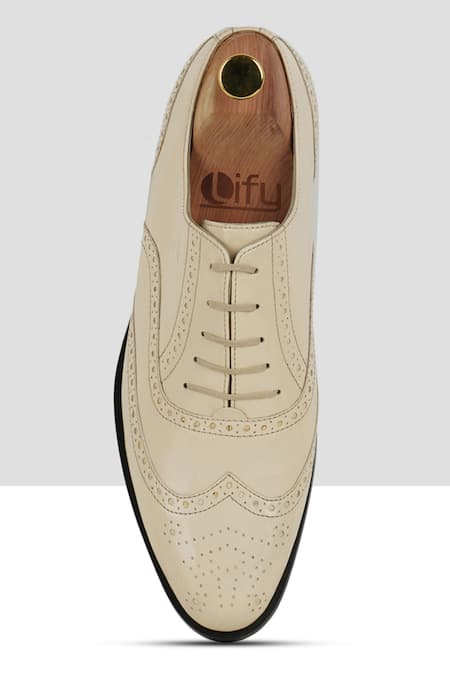 Buy_Ankit V Kapoor_Off White Solid Brogue Shoes _Online_at_Aza_Fashions