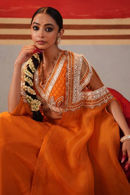 Kesar Studio Orange Silk, Organza Mirrors, Lace, Cut Jaal Embroidered Cape With Lehenga Set at Aza Fashions Kesar Studio_Orange Silk, Organza Mirrors, Lace, Cut Jaal Embroidered Cape With Lehenga Set_at_Aza_Fashions