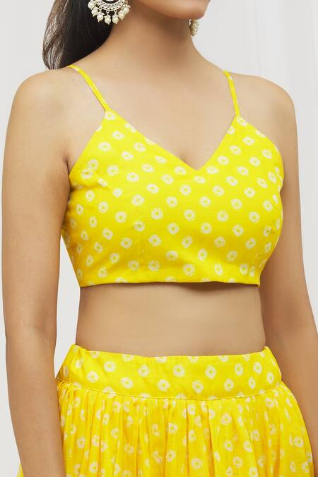Shop Yuvraani Jaipur Yellow Chanderi, Cotton Tassels V-neck Bandhani Print Lehenga Set Online at Aza Fashions Shop_Yuvraani Jaipur_Yellow Chanderi, Cotton Tassels V-neck Bandhani Print Lehenga Set _Online_at_Aza_Fashions
