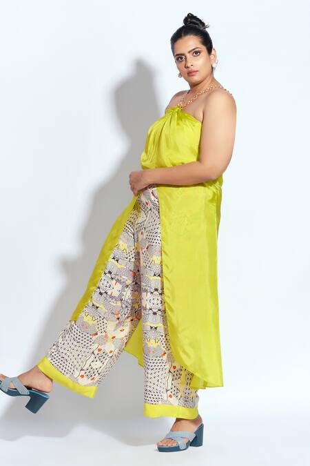 Shop Neetiandmudita Yellow Silk, Crepe Chains Halter Neck Front Slit Tunic With Flare Pant at Aza Fashions Shop_Neetiandmudita_Yellow Silk, Crepe Chains Halter Neck Front Slit Tunic With Flare Pant _at_Aza_Fashions