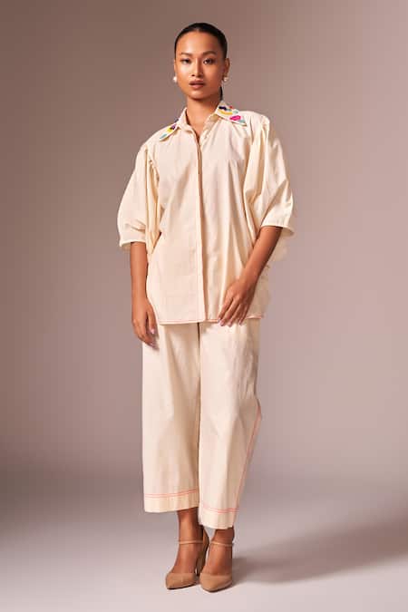 Neetiandmudita Ivory Cotton Embellished Floral Collared Bead Shirt And Pant Set Online at Aza Fashions Neetiandmudita_Ivory Cotton Embellished Floral Collared Bead Shirt And Pant Set _Online_at_Aza_Fashions