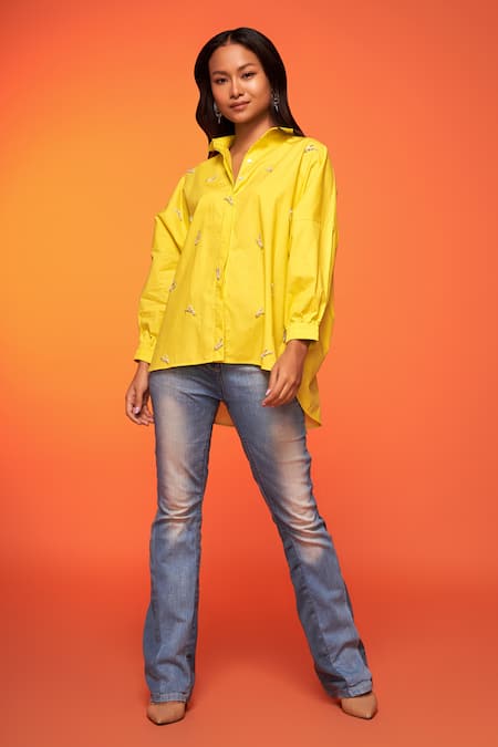 Shop Neetiandmudita Yellow Cotton Embroidered Diamante Collared Asymmetric Shirt at Aza Fashions Shop_Neetiandmudita_Yellow Cotton Embroidered Diamante Collared Asymmetric Shirt _at_Aza_Fashions