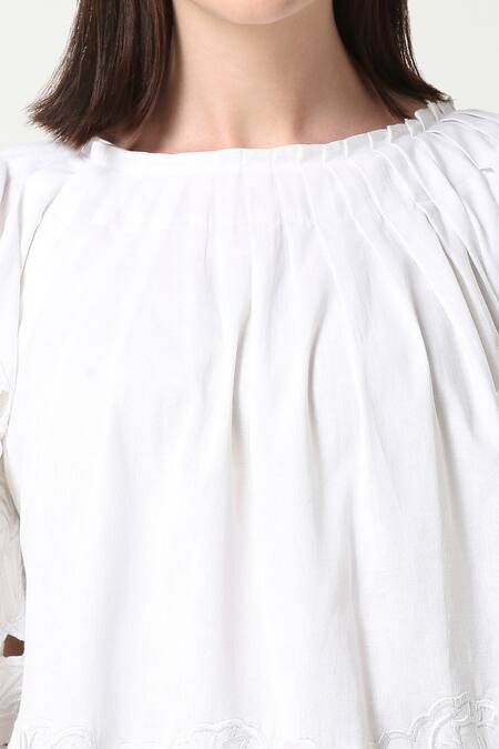 Neha Gursahani_White Cotton Linen Round Floral Cutwork Tunic _at_Aza_Fashions