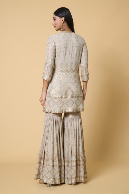 Shop Nakul Sen Grey Silk Sequins Round Neck Embroidered Kurta Gharara Set at Aza Fashions Shop_Nakul Sen_Grey Silk Sequins Round Neck Embroidered Kurta Gharara Set _at_Aza_Fashions