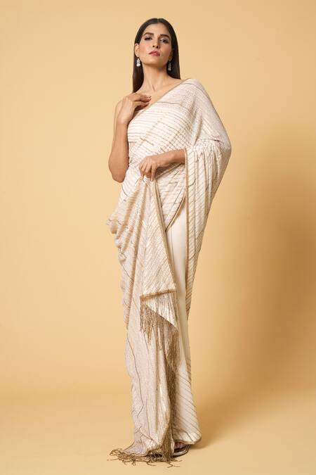 Shop Nakul Sen Ivory Silk, Chiffon Sequins Diagonal Saree With Unstitched Bouse Piece Online at Aza Fashions Shop_Nakul Sen_Ivory Silk, Chiffon Sequins Diagonal Saree With Unstitched Bouse Piece _Online_at_Aza_Fashions