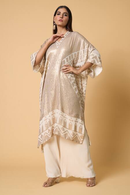 Nakul Sen Ivory Silk, Chiffon Sequins V-neck Contrasting Work Kaftan And Palazzo Set at Aza Fashions Nakul Sen_Ivory Silk, Chiffon Sequins V-neck Contrasting Work Kaftan And Palazzo Set _at_Aza_Fashions