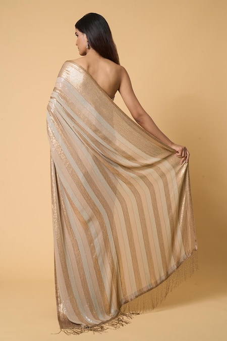 Shop Nakul Sen Beige Silk, Chiffon Sequins Striped Saree With Unstitched Blouse Piece at Aza Fashions Shop_Nakul Sen_Beige Silk, Chiffon Sequins Striped Saree With Unstitched Blouse Piece _at_Aza_Fashions