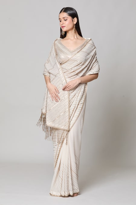 Nakul Sen Ivory Silk, Chiffon Sequins V-neck Saree With Embroidered Blouse Online at Aza Fashions Nakul Sen_Ivory Silk, Chiffon Sequins V-neck Saree With Embroidered Blouse _Online_at_Aza_Fashions
