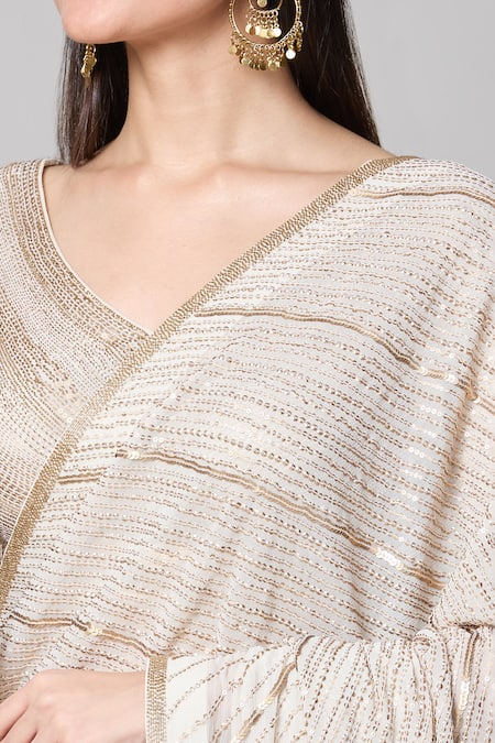Shop Nakul Sen Ivory Silk, Chiffon Sequins V-neck Saree With Embroidered Blouse Online at Aza Fashions Shop_Nakul Sen_Ivory Silk, Chiffon Sequins V-neck Saree With Embroidered Blouse _Online_at_Aza_Fashions