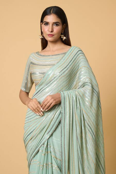 Shop Nakul Sen Blue Silk Sequins Boat Neck Striped Pastel Saree With Blouse Online at Aza Fashions Shop_Nakul Sen_Blue Silk Sequins Boat Neck Striped Pastel Saree With Blouse _Online_at_Aza_Fashions