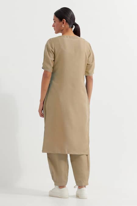 Shop The Indian Cause Beige Cotton Round Neck Joanna Straight Plain Kurta With Pant at Aza Fashions Shop_The Indian Cause_Beige Cotton Round Neck Joanna Straight Plain Kurta With Pant_at_Aza_Fashions