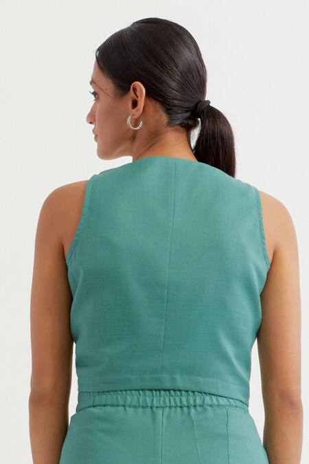 The Indian Cause Green V-neck Button Down Sleeveless Vest And Pant Set at Aza Fashions The Indian Cause_Green V-neck Button Down Sleeveless Vest And Pant Set_at_Aza_Fashions