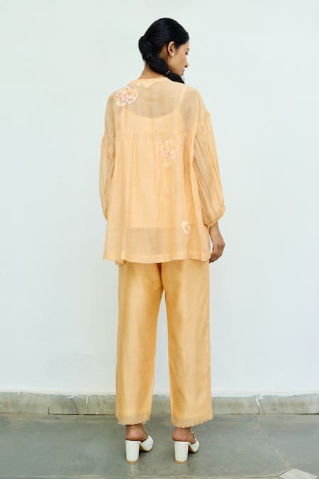 Shop Ayaka Peach Top Mul Chanderi Hand Embroidery Floral Top Round Sheer at Aza Fashions Shop_Ayaka_Peach Top Mul Chanderi Hand Embroidery Floral Top Round Sheer _at_Aza_Fashions