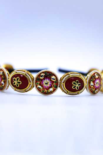 Foot Fuel Red Crystals, Beads Embellished Circular Carved Brooch Hairband Online at Aza Fashions Foot Fuel_Red Crystals, Beads Embellished Circular Carved Brooch Hairband _Online_at_Aza_Fashions