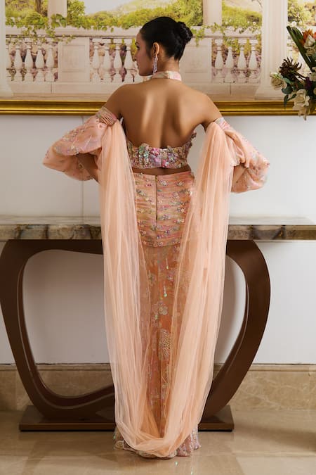 Shop Moledro Peach Organza, Net Sequins, Marissa Florence Embroidered Blouse Draped Skirt Set at Aza Fashions Shop_Moledro_Peach Organza, Net Sequins, Marissa Florence Embroidered Blouse Draped Skirt Set _at_Aza_Fashions
