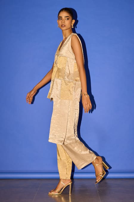 Esha Arora_Gold Tissue, Cotton, Silk Cut Work V-neck Patchwork Embroidered Jacket Pant Set _at_Aza_Fashions