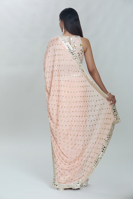 Shop Vana Ethnics Peach Viscose Sequins, Mirrors Sheesha Embroidered Border Saree With Blouse at Aza Fashions Shop_Vana Ethnics_Peach Viscose Sequins, Mirrors Sheesha Embroidered Border Saree With Blouse _at_Aza_Fashions