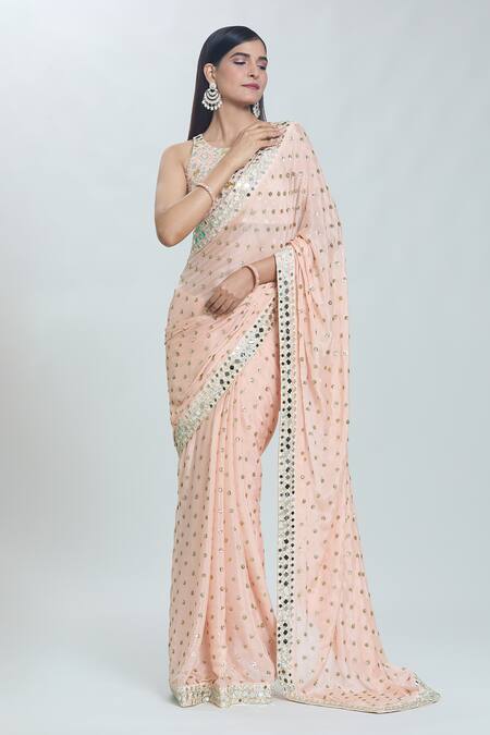 Vana Ethnics Peach Viscose Sequins, Mirrors Sheesha Embroidered Border Saree With Blouse Online at Aza Fashions Vana Ethnics_Peach Viscose Sequins, Mirrors Sheesha Embroidered Border Saree With Blouse _Online_at_Aza_Fashions