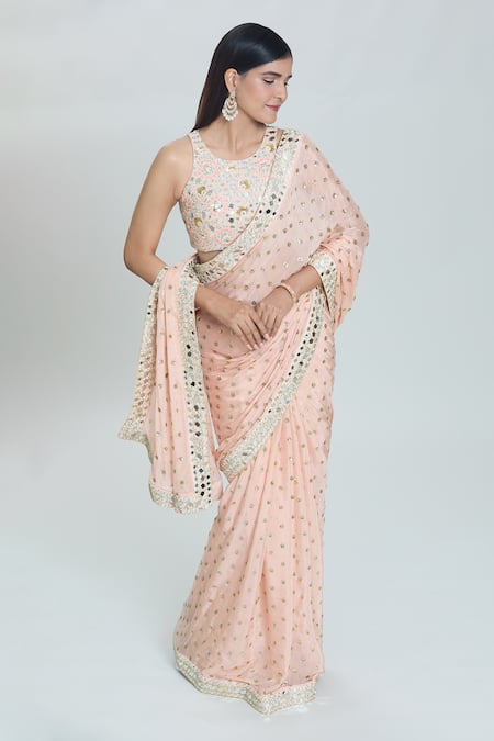 Shop Vana Ethnics Peach Viscose Sequins, Mirrors Sheesha Embroidered Border Saree With Blouse Online at Aza Fashions Shop_Vana Ethnics_Peach Viscose Sequins, Mirrors Sheesha Embroidered Border Saree With Blouse _Online_at_Aza_Fashions