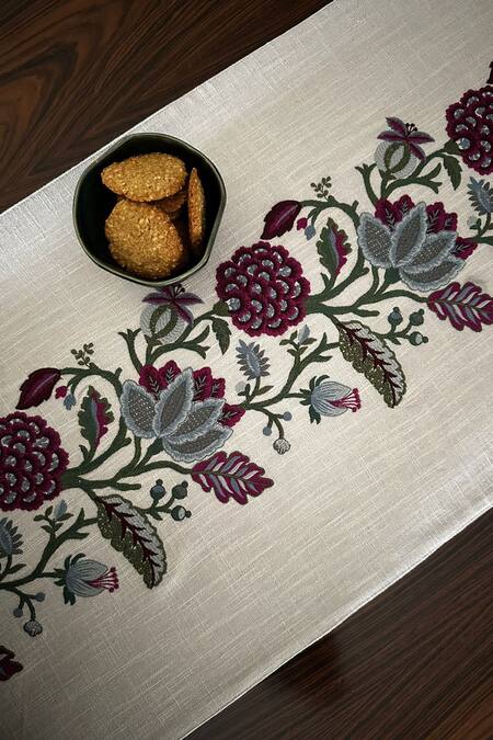 House Of Inari Wine 100% Cotton Floral, Tassels And Embroidered Table Runner Online at Aza Fashions House Of Inari_Wine 100% Cotton Floral, Tassels And Embroidered Table Runner_Online_at_Aza_Fashions