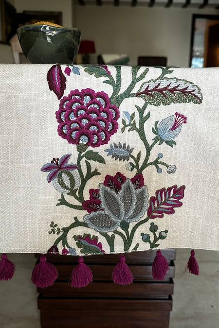 House Of Inari Wine 100% Cotton Floral, Tassels And Embroidered Table Runner at Aza Fashions House Of Inari_Wine 100% Cotton Floral, Tassels And Embroidered Table Runner_at_Aza_Fashions