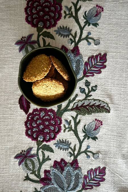 Shop House Of Inari Wine 100% Cotton Floral, Tassels Work Table Runner Online at Aza Fashions Shop_House Of Inari_Wine 100% Cotton Floral, Tassels Work Table Runner_Online_at_Aza_Fashions