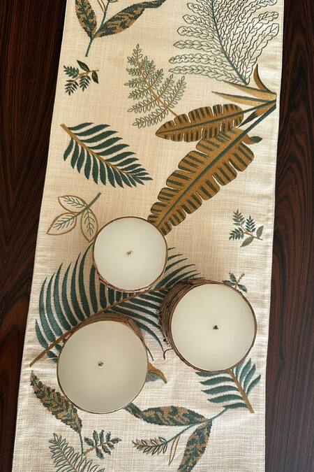 Buy House Of Inari Beige 100% Cotton Thread, Tassels, Palm Leaves And Embroidered Table Runner Online at Aza Fashions Buy_House Of Inari_Beige 100% Cotton Thread, Tassels, Palm Leaves And Embroidered Table Runner_Online_at_Aza_Fashions