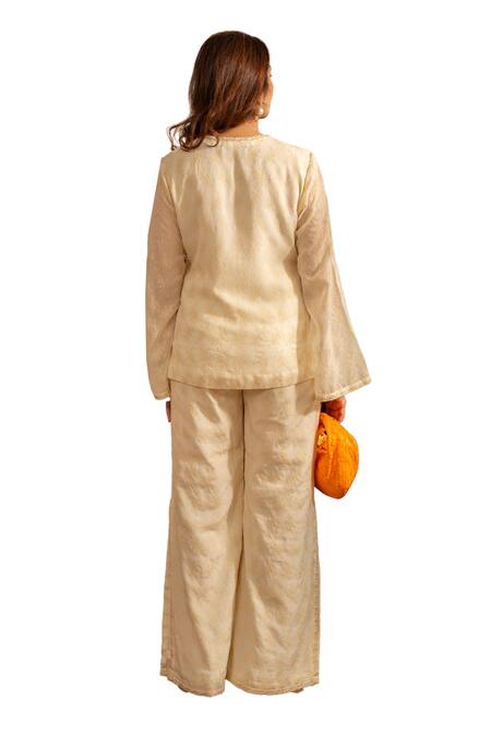 House Of Inari_Off White Pure Georgette Embroidery Poppy Blossom Top With Bell Bottom Pant _at_Aza_Fashions