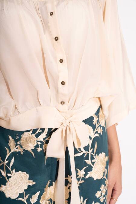 House Of Inari Off White Pure Silk Crepe Embellished 3d Flower Collared Shirt at Aza Fashions House Of Inari_Off White Pure Silk Crepe Embellished 3d Flower Collared Shirt _at_Aza_Fashions