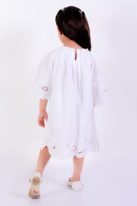 Shop Neha Gursahani Ivory Cotton Linen Embroidery Cutwork Bloom Dress at Aza Fashions Shop_Neha Gursahani_Ivory Cotton Linen Embroidery Cutwork Bloom Dress _at_Aza_Fashions