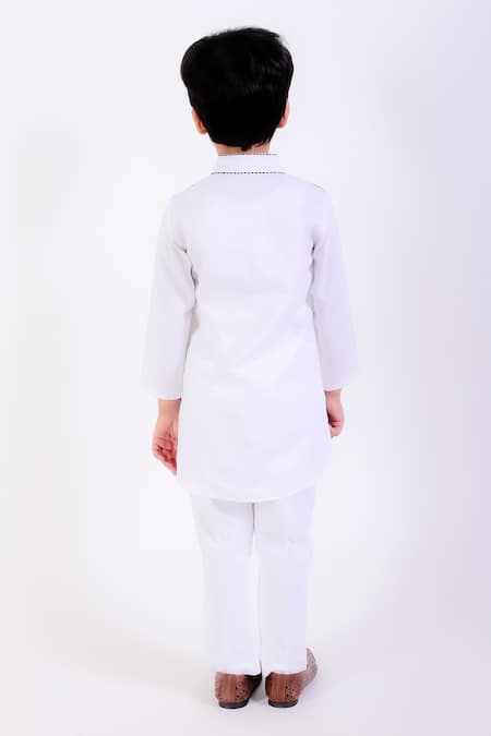 Shop Neha Gursahani Ivory Cotton Linen Embroidery Stitch Work Contrast Kurta With Pant at Aza Fashions Shop_Neha Gursahani_Ivory Cotton Linen Embroidery Stitch Work Contrast Kurta With Pant _at_Aza_Fashions