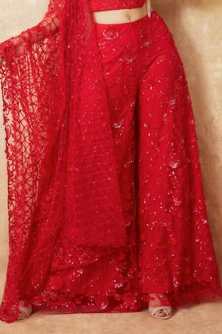 Premya By Manishii Red Tulle Sequins, Cut Work Floral Embroidered Corset Blouse Flared Pant Set at Aza Fashions Premya By Manishii_Red Tulle Sequins, Cut Work Floral Embroidered Corset Blouse Flared Pant Set _at_Aza_Fashions