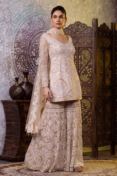 Raj Arora_Cream Net Sequins, Zari, Cut Work V-neck Embroidered Short Kurta Gharara Set _Online_at_Aza_Fashions
