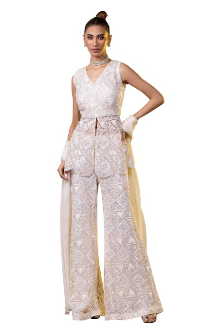 Raj Arora_Ivory Net Sequins V-neck Embroidered Peplum Top Bell Bottom Pant Set _Online_at_Aza_Fashions