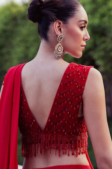 Buy_Khushboo Chugh_Red Georgette Beads V-neck Tiered Solid Pre-draped Saree With Embellished Blouse _Online_at_Aza_Fashions
