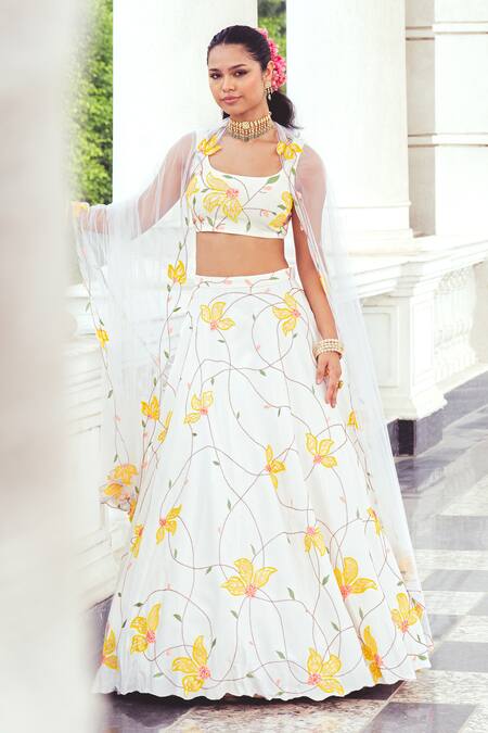 Khushboo Chugh_Ivory Net, Crepe Beads, Sequins, Embroidery Floral Embellished Lehenga Set _Online_at_Aza_Fashions