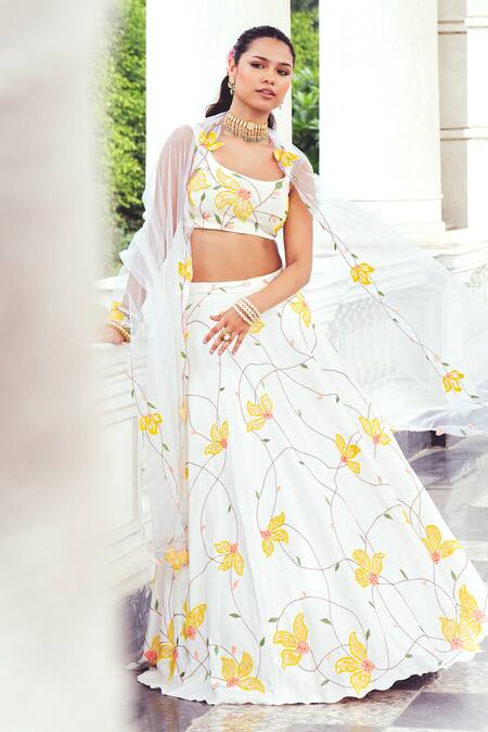 Buy_Khushboo Chugh_Ivory Net, Crepe Beads, Sequins, Embroidery Floral Embellished Lehenga Set _Online_at_Aza_Fashions