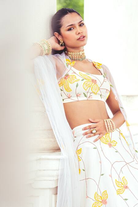 Shop_Khushboo Chugh_Ivory Net, Crepe Beads, Sequins, Embroidery Floral Embellished Lehenga Set _Online_at_Aza_Fashions