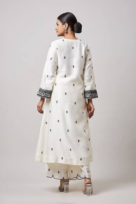 Shop Sanjev Marwaaha Ivory Vishika Silk Hand Embroidery Floral Round Contrast Kurta Pant Set at Aza Fashions Shop_Sanjev Marwaaha_Ivory Vishika Silk Hand Embroidery Floral Round Contrast Kurta Pant Set_at_Aza_Fashions