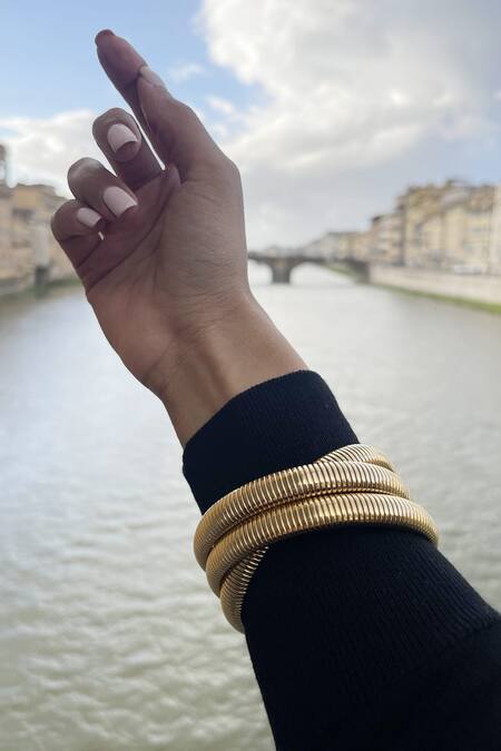 Buy The Jewel Factor Gold Plated Cut Work Greek Goddess Bangle Online at Aza Fashions Buy_The Jewel Factor_Gold Plated Cut Work Greek Goddess Bangle_Online_at_Aza_Fashions